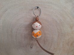 sleutelhanger badjuf oranje. Zij let goed op wanneer je gaat zwemmen.